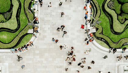 An image of a square full of trees from above.