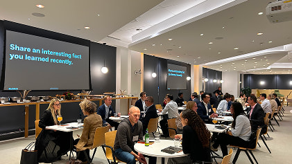 Two people, a man and a woman, talking.